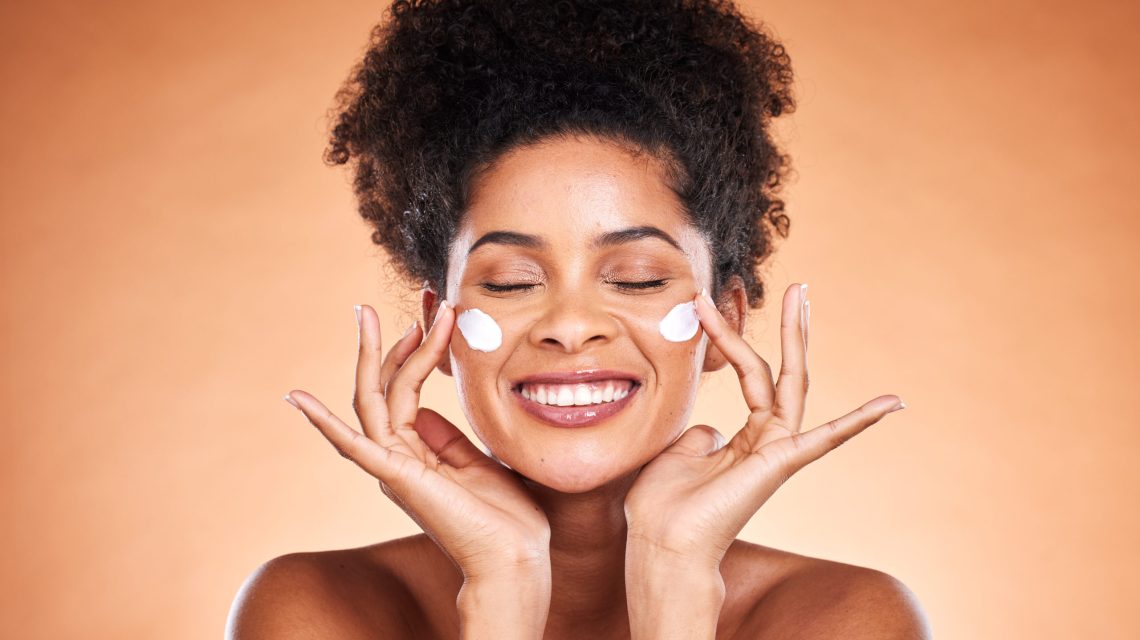 Black woman, skincare and sunscreen lotion for wellness, health and happy smile. Mockup for natural.